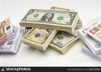 Stack of US and European Currency