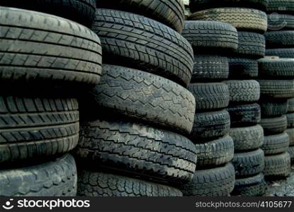 stack of used tyres