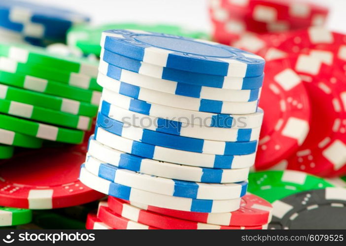 Stack of various casino chips - gambling concept