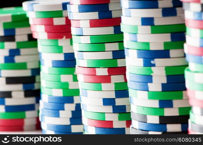 Stack of various casino chips - gambling concept