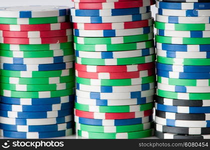 Stack of various casino chips - gambling concept