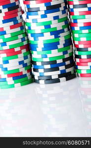 Stack of various casino chips - gambling concept