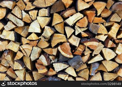 Stack of wood outside an old mountain house