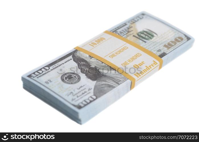 Stack one hundred dollars bills with tape isolated on white background. Stack one hundred dollars bills with tape