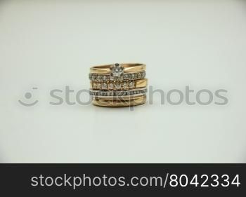 Stacked diamond rings in white and yellow gold
