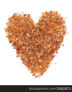 stacked heart of brown sugar. Isolated on white background