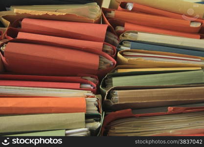 Stacked office files: pile of files in an office