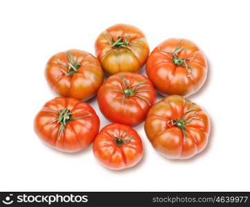 Stacked red tomatoes isolated on white background