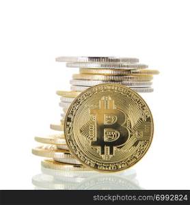 Stacked silver bitcoins isolated over white background