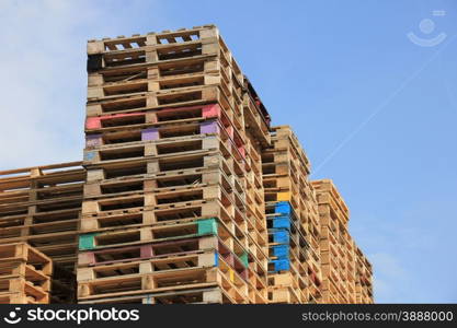 Stacked wooden pallets at a pallet storage