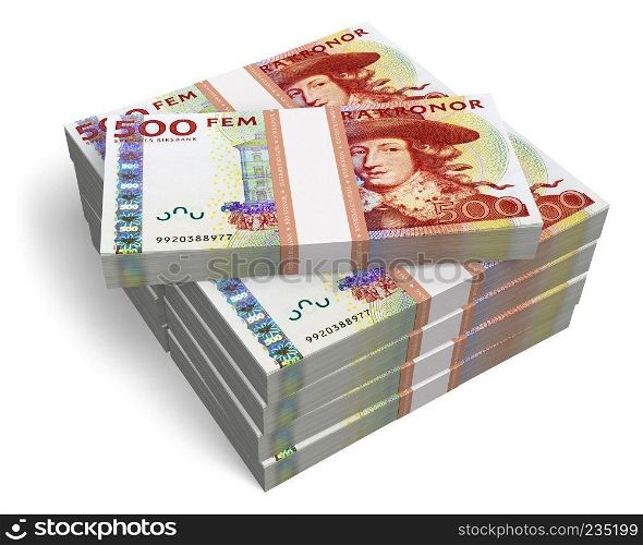 Stacks of 500 Swedish krona banknotes isolated on white background