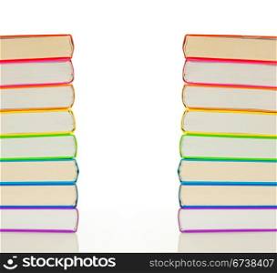 Stacks of colorful books on the white background
