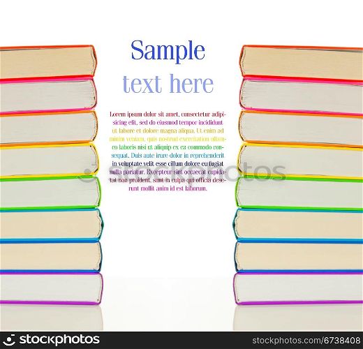 Stacks of colorful books on the white background