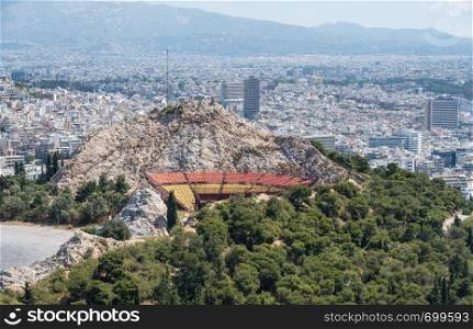 Stadium for theater shows on the summit of Lycabettus hill. Panorama of city of Athens from Lycabettus hill