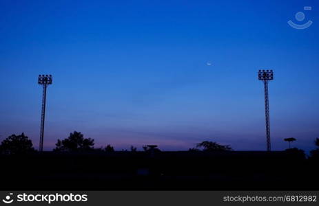 Stadium lights on a sports field at night