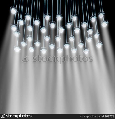 Stage lights as a group of shinning spotlights illuminating with bright beams of light to advertise and promote an important theatrical show event or product as a marketing and communication concept.