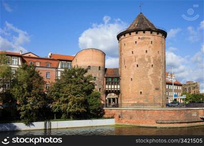 Stagiewna Gate (Polish: Stagwie Mleczne) on the Granary Island, Gothic style defensive tower in the city of Gdansk, Poland.