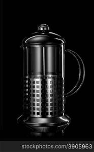 stainless steel teapot isolated on black
