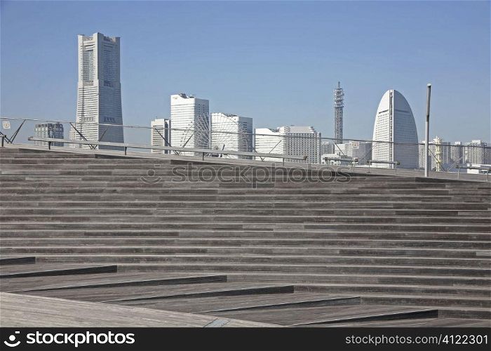 Staircase with metropolis backdrop
