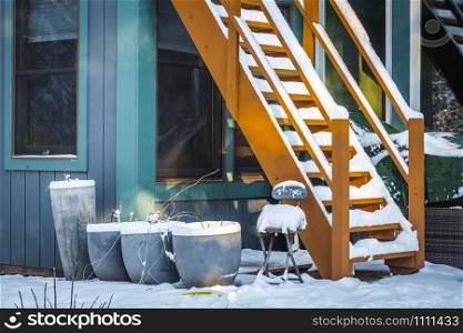 Stairs covered snow house in suburbs in winter time. Stairs covered snow house in suburbs in winter