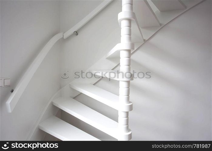 Stairs in modern white room, white wooden stairs with white wall modern. Stairs in modern white room, white wooden stairs with white wall