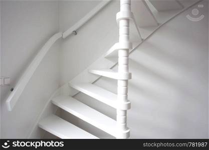 Stairs in modern white room, white wooden stairs with white wall modern. Stairs in modern white room, white wooden stairs with white wall