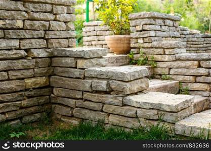stairs made of stone on a green lawn