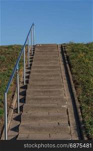 Stairs on the dike at Zons on the Rhine river in Germany.
