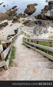 Stairs with access to a nice beach northwest of Spain