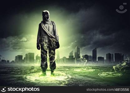 Stalker and recycle sign. Man in respirator against nuclear background touching symbol. Pollution concept