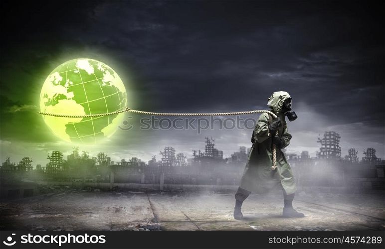 Stalker pulling rope. Man in respirator against nuclear background. Global pollution