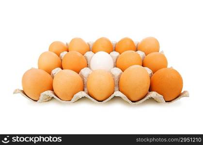 Stand out of crowd concept with eggs on white