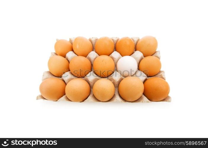 Stand out of crowd concept with eggs on white