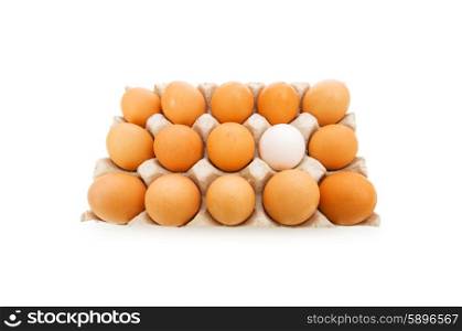 Stand out of crowd concept with eggs on white