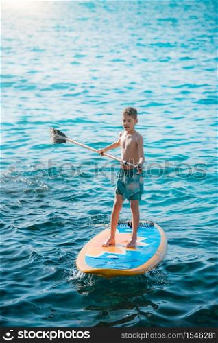 Stand Up Paddle Board at Sea. Stand Up Paddle Boarding