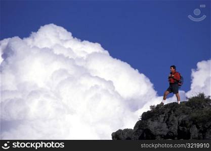 Standing on a Peak with Clouds