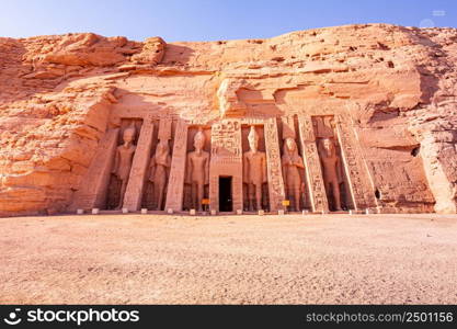 Standing statue in front of The Temple of Hathor and Nefertari the queen of pharaoh Rameses II at Abu Simbel, Aswan, Upper Egypt.