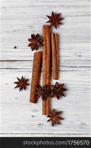 star anise and cinnamon isolated on a wooden background. star anise and cinnamon