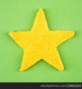 Star sugar cookie with decorative icing.