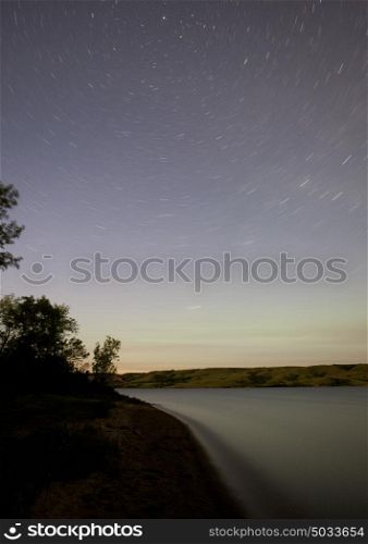 Star Trails on Northern Lake in Saskatchewan Canada