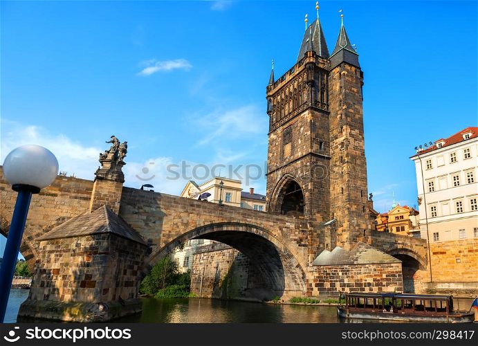 Staromestska tower and Charles bridge on Vltava in Prague