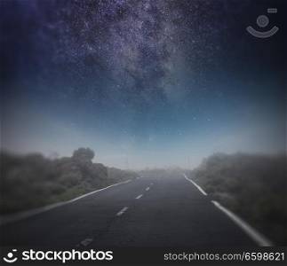 starry night sky above the road. Astrophotography