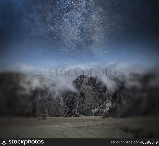 starry night sky over the mountains. Astrophotography