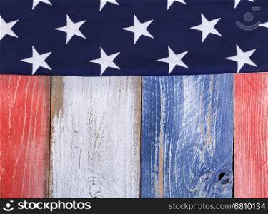 Stars on rustic painted boards in national colors of United States of America.