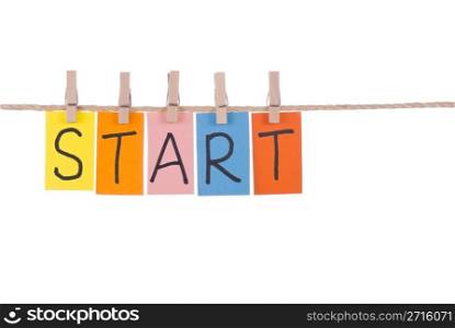 Start, Colorful words hang on rope by wooden peg