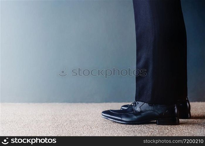 Start Concept. Low Section of Businessman on Formal Business Dress Get Ready to Moving Forward. Cropped Image with Copy Space. Side View