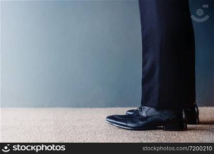 Start Concept. Low Section of Businessman on Formal Business Dress Get Ready to Moving Forward. Cropped Image with Copy Space. Side View