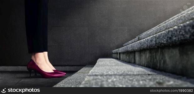Start Concept. Woman Power. Low Section of Business Female Standing on First Step Staircase. Get Ready for Moving Forward to New Challenge. Cropped Image. Side View