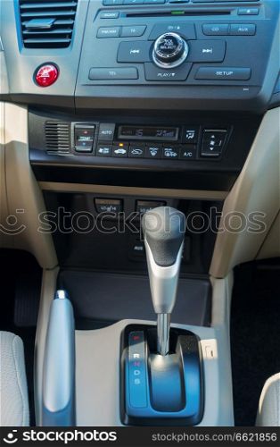 Start engine button on modern car dashboard. Car start engine button