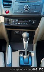 Start engine button on modern car dashboard. Car start engine button
